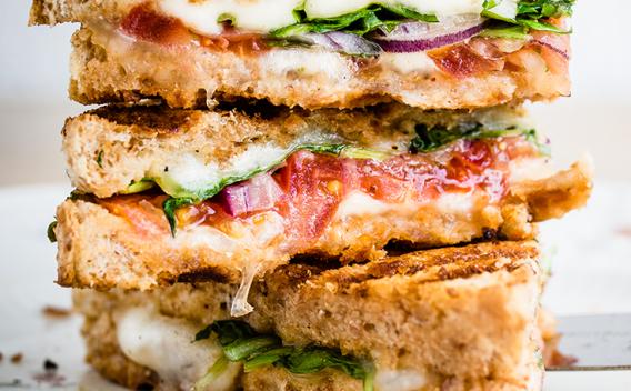 A stacked of sandwiches on a plate