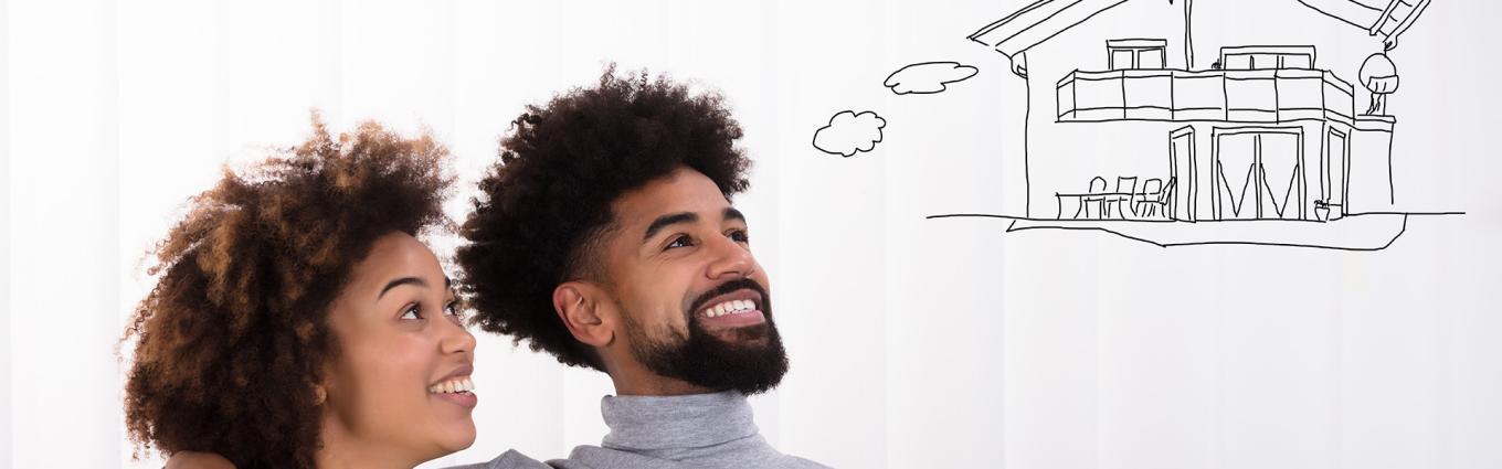 A happy couple dreaming of a home